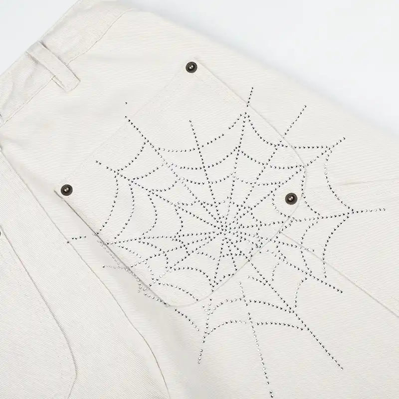 Jorts en jean avec strass et motif toile d'araignée-550