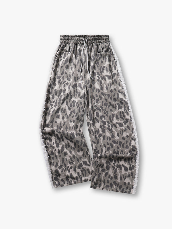 Pantalones anchos con estampado de leopardo gris y detalles laterales deshilachados con textura y cintura elástica