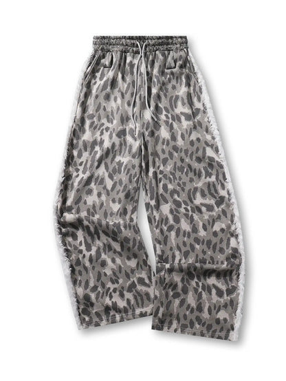 Pantalon large à imprimé léopard gris avec détails latéraux texturés et effilochés, ceinture élastique