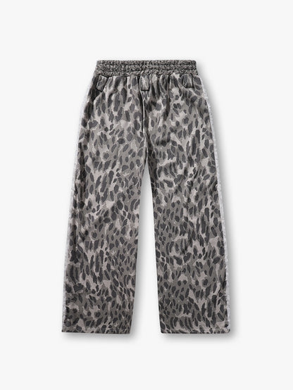 Pantalon large à imprimé léopard gris avec détails latéraux texturés et effilochés, ceinture élastique