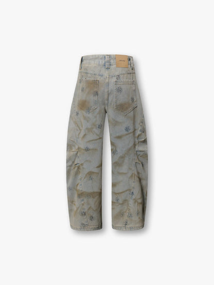 Vintage Aesthetic Relaxed Fit Distressed Denim Pants with Subtle Patterned Accents Wide-Leg Design and Washed-Out Texture